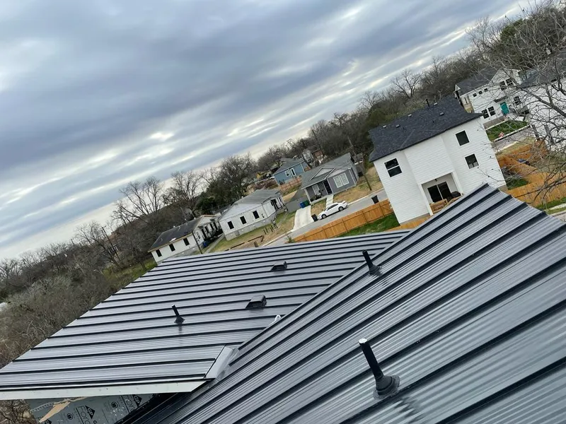 Standing seam metal roof panels with vents for Skylight Repair in Olivette